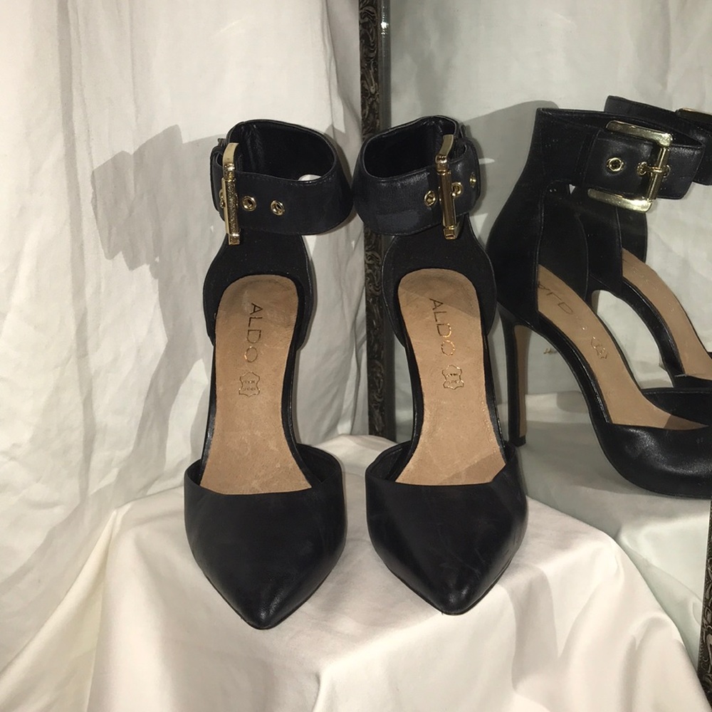 Black Aldo heels with gold buckle, size 5